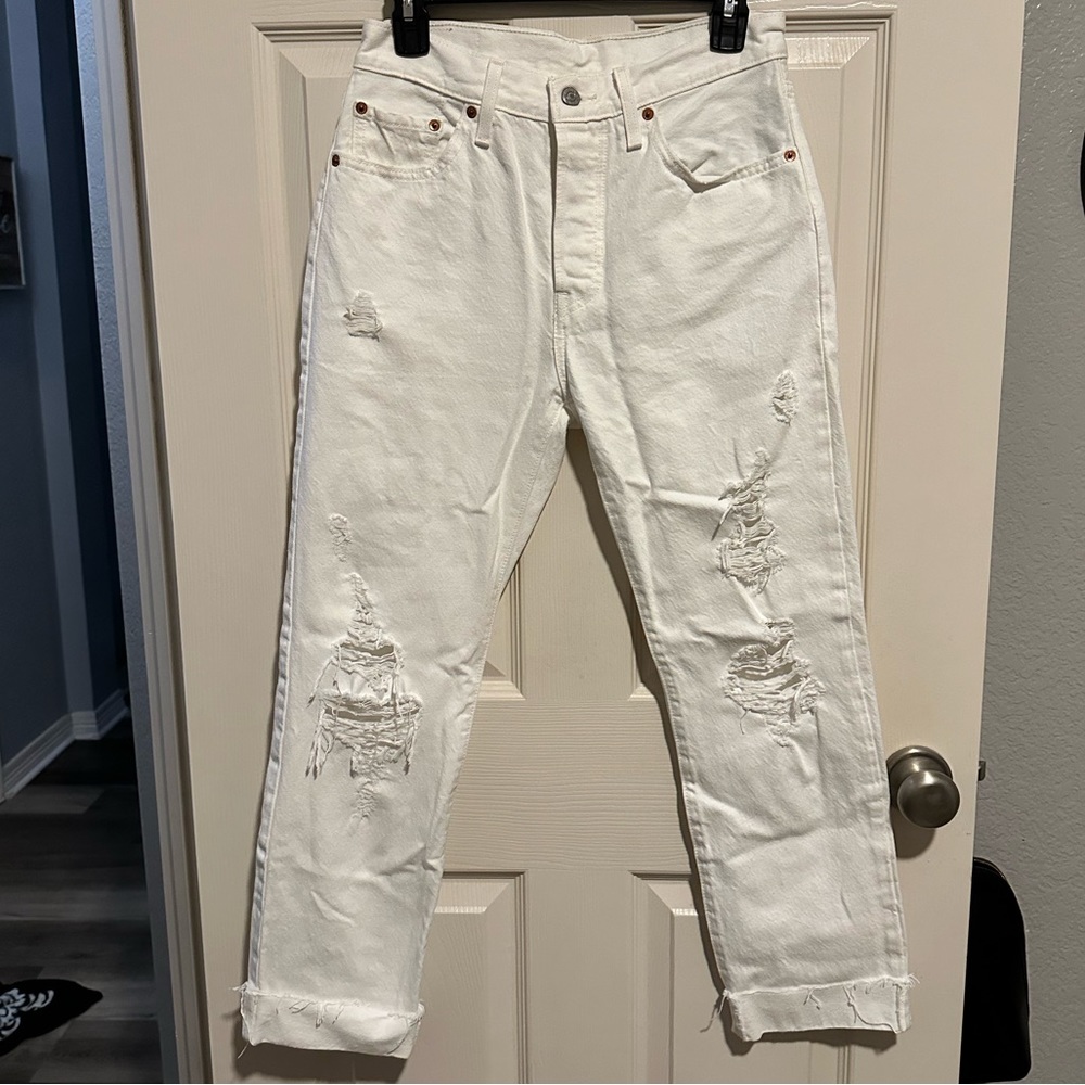 white ripped high wasted denim jeans
